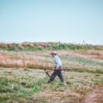 man walking on farm